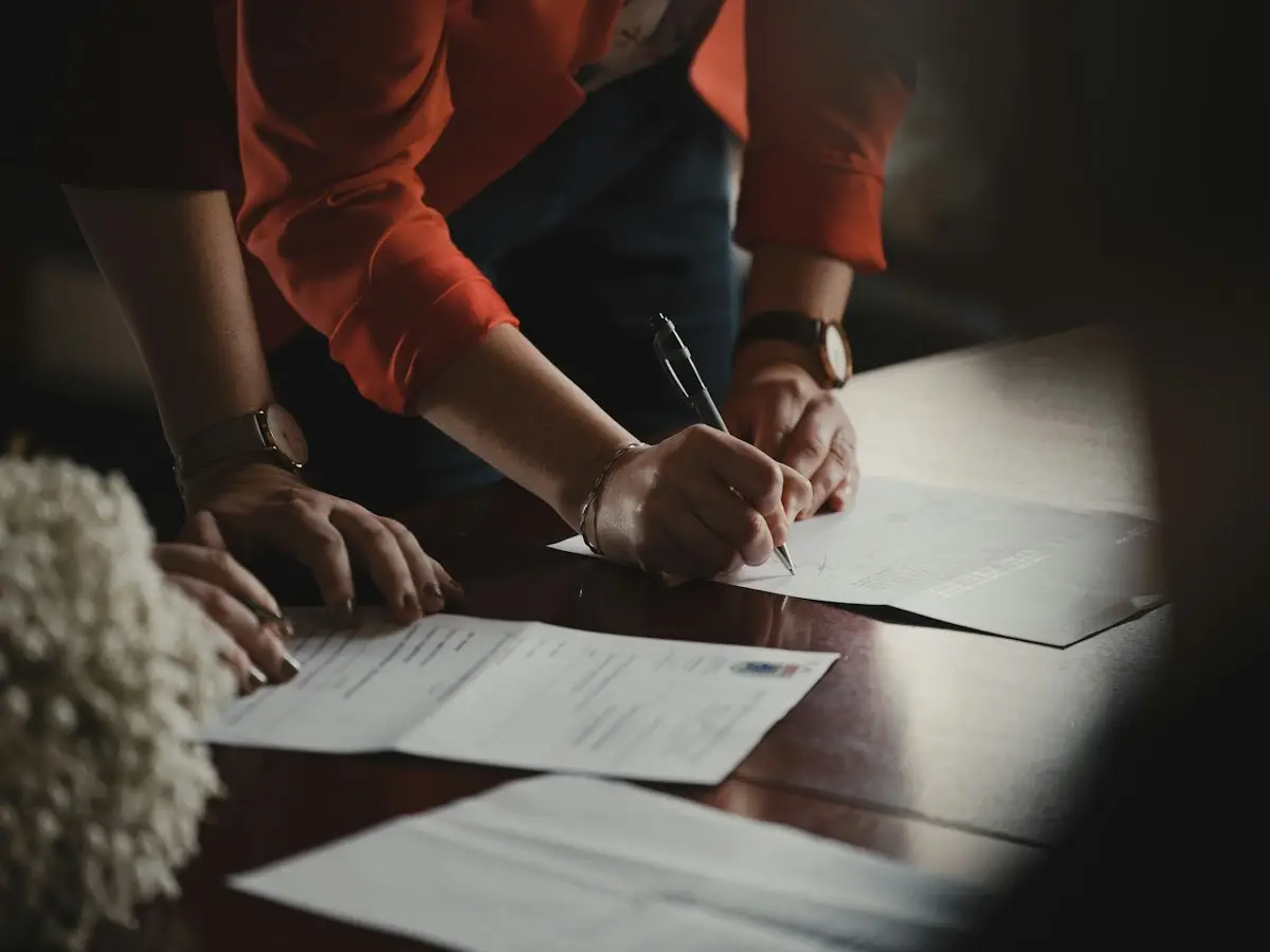 Businesspeople signing a contract
